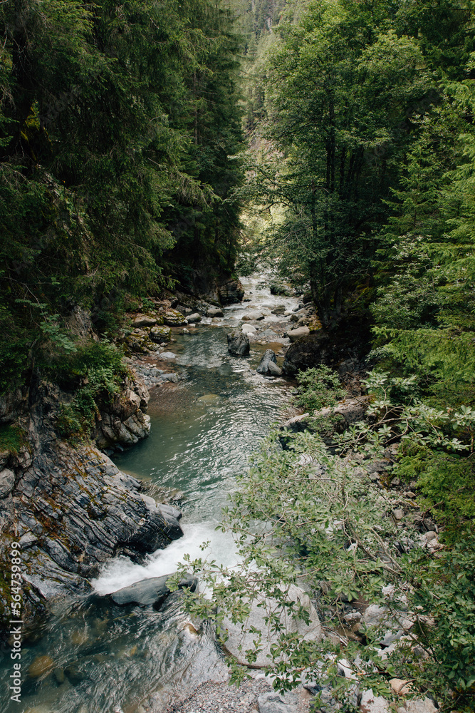 Picturesque rocky river is flowing through  gorge Zügenschlucht