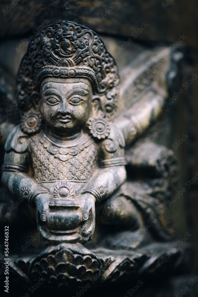 A hindu statue adorns the hindu temple of Shiva in Kathmandu