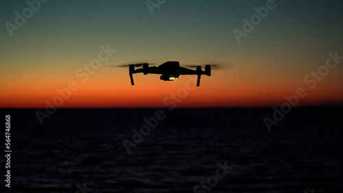 Drone in the air, spectacular sunrise over the sea