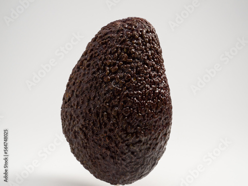 Ripe avocado on a white background. Fresh avocado.