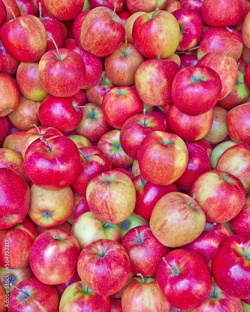 Bright red, fresh apples top view close-up. Natural, juicy background. Bright red, fresh apples top view close-up. Natural, juicy background.