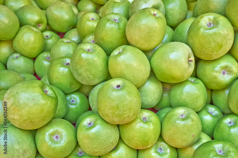 Bright green, fresh apples top view close-up. Natural, juicy background. Bright green, fresh apples top view close-up. Natural, juicy background.