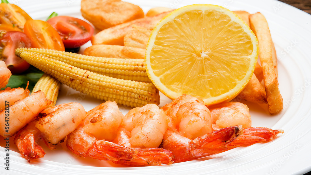 Close up from seafood on plate with lemon Close up from seafood on plate with lemon