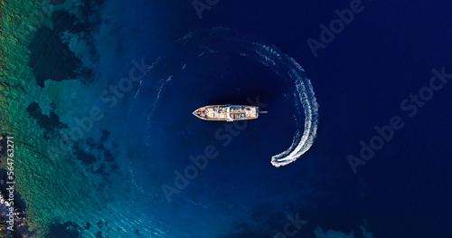 bird's eye drone photo of luxury yacht in the sea