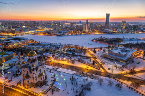 Winter Yekaterinburg and Temple on Blood in beautiful blue clear sunset. Aerial view of Yekaterinburg, Russia. Translation of the text on the temple: Honest to the Lord is the death of His saints. © Dmitrii Potashkin