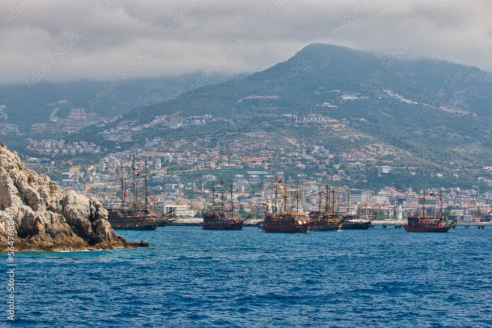 Pirates boats in Antalya bay nearby the beach