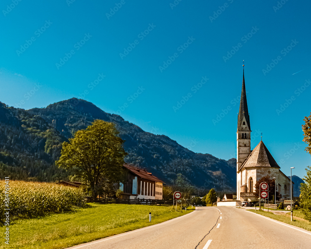 Beautiful alpine summer view with the famous church Saint Leonhard near Kundl, Tyrol, Austria