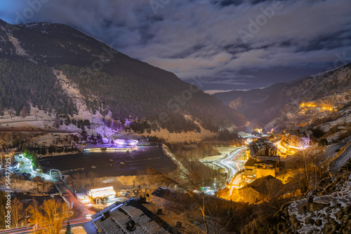 El Tarter town. Hotels, resorts, residential buildings and ski lifts illuminated by street lights at night. Ski winter holidays Andorra, Pyrenees