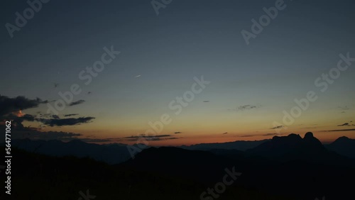 Zeitraffer Sonnenuntergang am Leobner in den Eisenerzer Alpen, BLick auf Rottenmanner Tauern, Totes Gebirge und Admonter Reichenstein, Steiermark photo