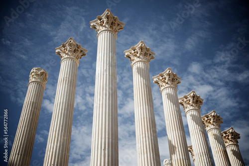 Low angle view of columns against sky at Roman temple photo