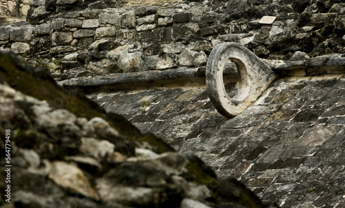 The hoop of a Mayan ball court sits on the side of a wall in the ruins of the ancient Mayan city of Coba in Mexico's Yucatan Pen photo