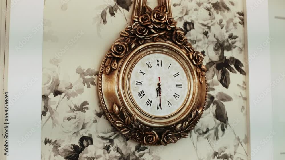 Golden Clock Hanging an a Wall Golden Clock Hanging an a Wall