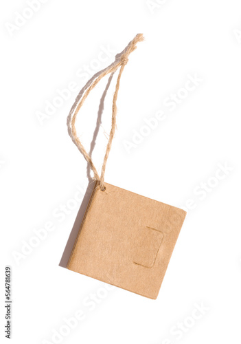 Brown paper square paper tag with a rope on a white isolated background