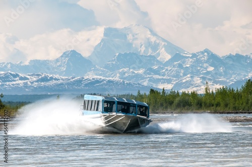 A jet boat speeds down the Susitna River. photo