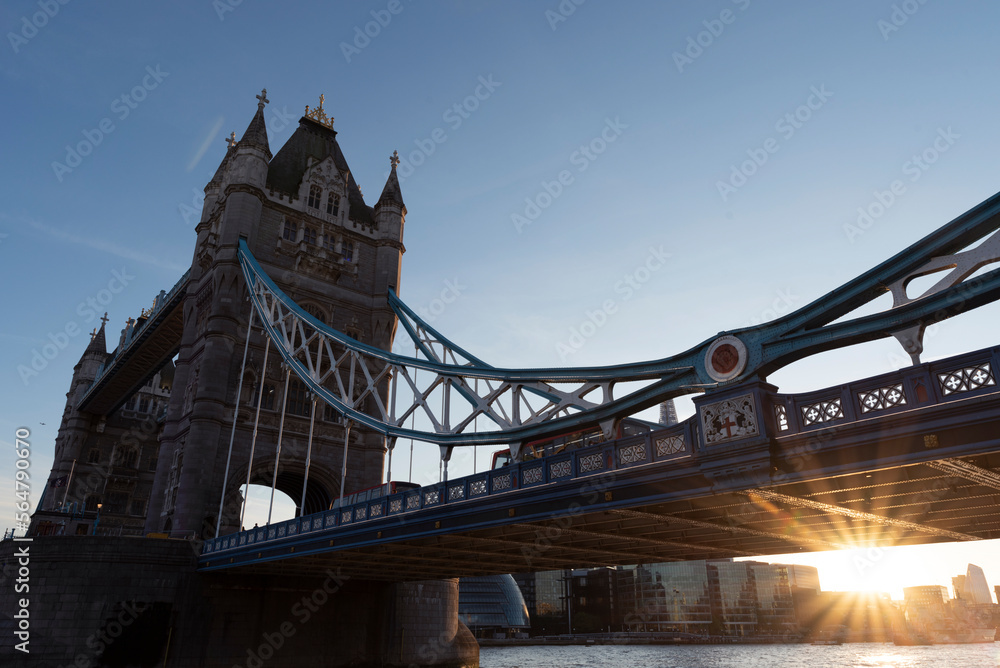 Obraz premium Tower Bridge in UK with sunset in beautiful day. Capital city in Great Britain in the evening. Tourism and attraction in Europe.