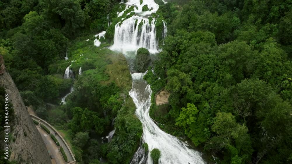 Approaching On Cascata Delle Marmore - Marmore Falls In Umbria, Italy. Aerial Drone Shot Approaching On Cascata Delle Marmore - Marmore Falls In Umbria, Italy. Aerial Drone Shot