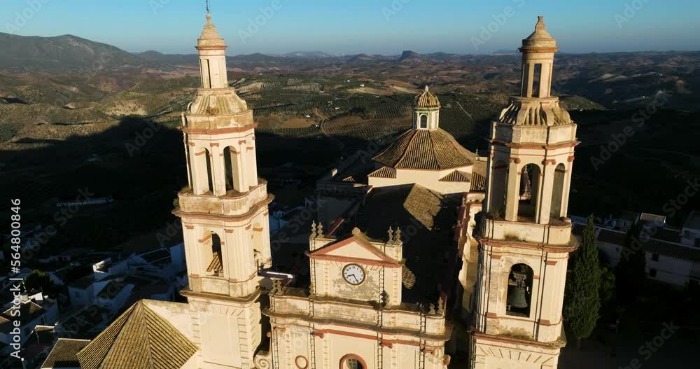 Nuestra Señora de la Encarnación In Olvera Village During Sunrise In Cádiz, Andalusia, Spain. Pullback Shot Nuestra Señora de la Encarnación In Olvera Village During Sunrise In Cádiz, Andalusia, Spain. Pullback Shot