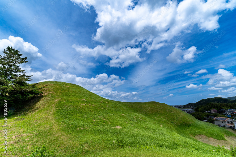 Hill - ancient tomb - and blue sky in Saga prefecture, Japan.