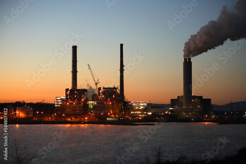 Predawn view of a coal-fired power plant on Lake Julian in Arden, NC photo