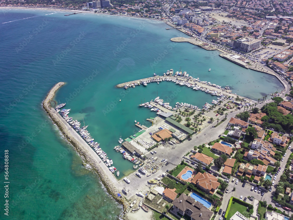 Drone view of Çeşme Yıldızburnu beach and boats in the harbor