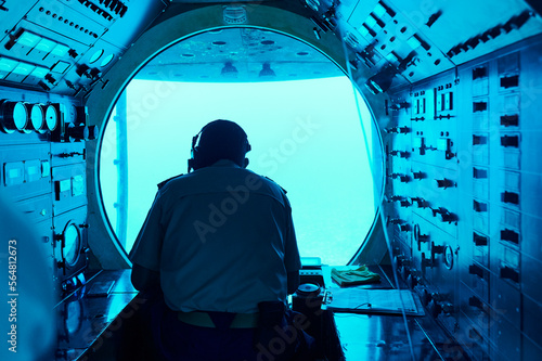 Captain piloting a submarine photo