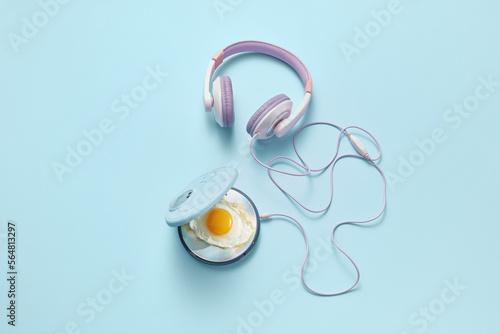 90s vintage CD player with fried egg inside. photo