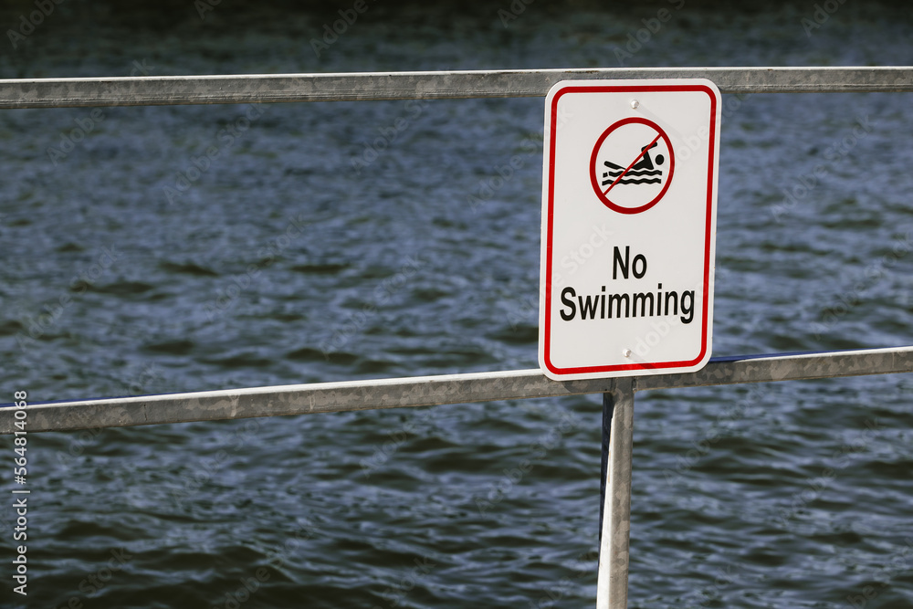 No swimming sign on a boat dock