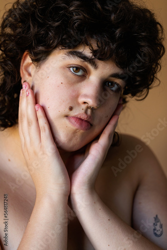 Short curly haired  woman nude portrait photo