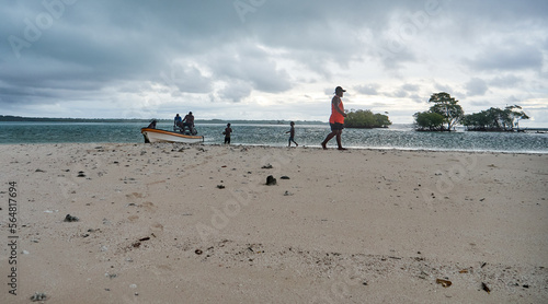 Atoll island destroyed by rising sea level change: climate refugees photo