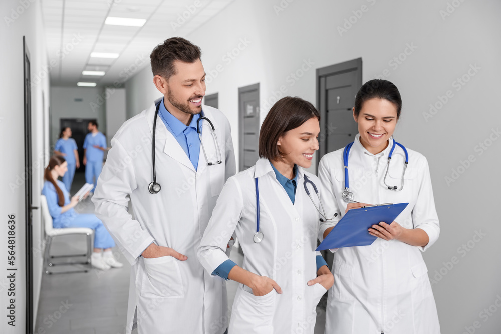 Team of medical students in college hallway