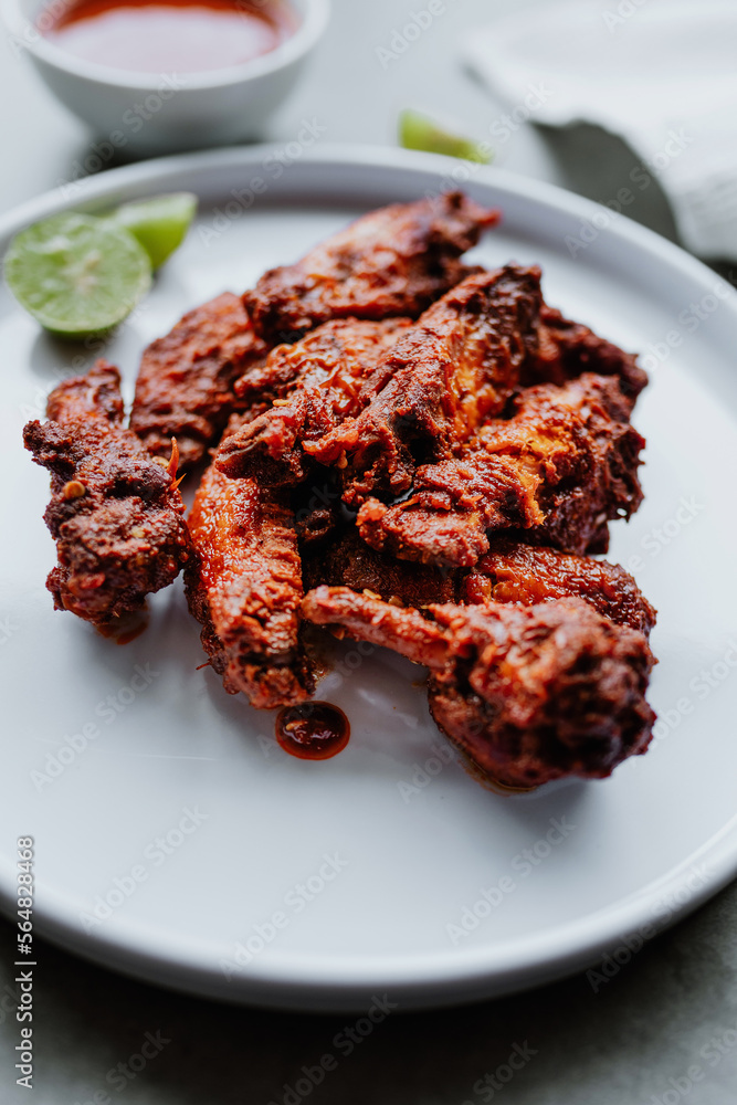 spicy chicken wings with buffalo sauce. Food with rustic background with copy space. Top view spicy chicken wings with buffalo sauce. Food with rustic background with copy space. Top view