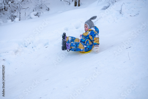 winter sledding downhill l/ #1 photo