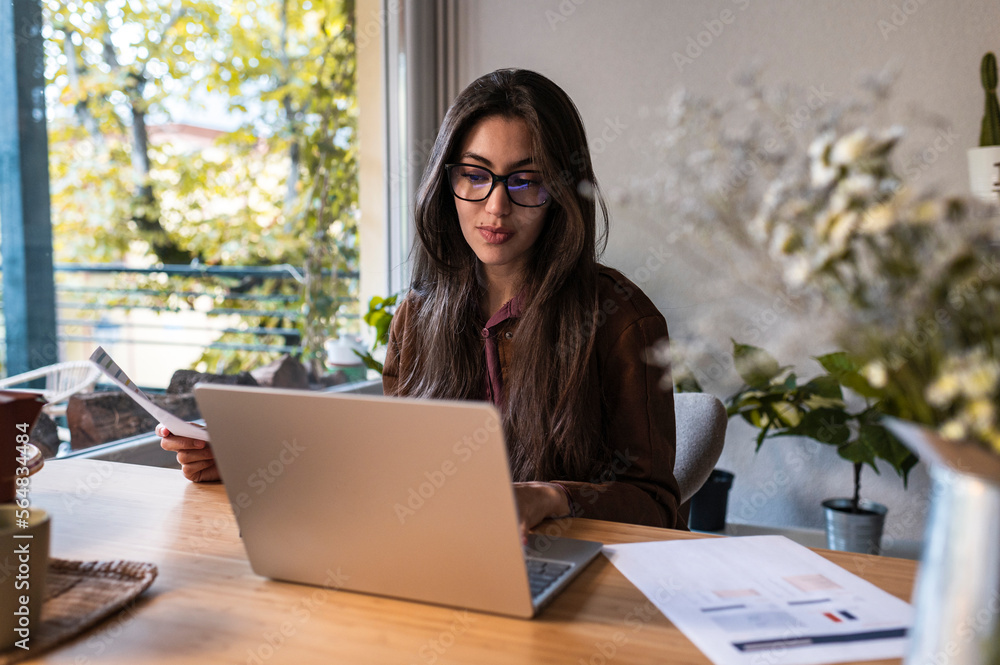 Muslim woman working from home Muslim woman working from home