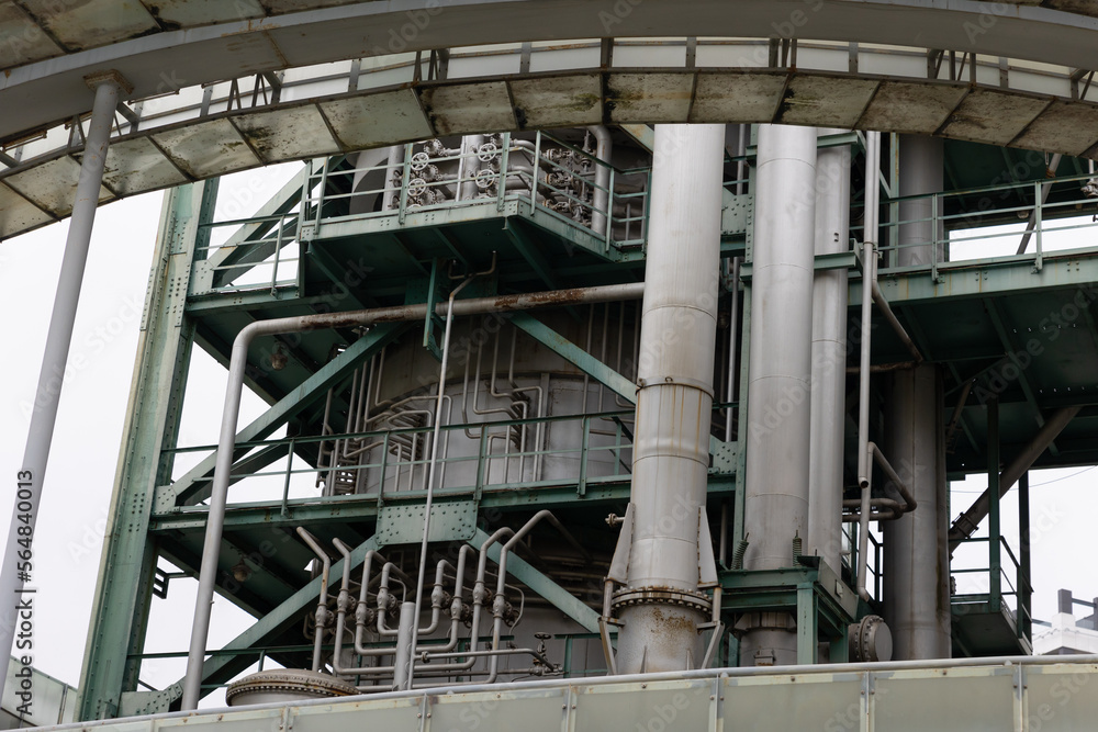 Lots of pipes on the surface of the oil and gas processing tower Lots of pipes on the surface of the oil and gas processing tower
