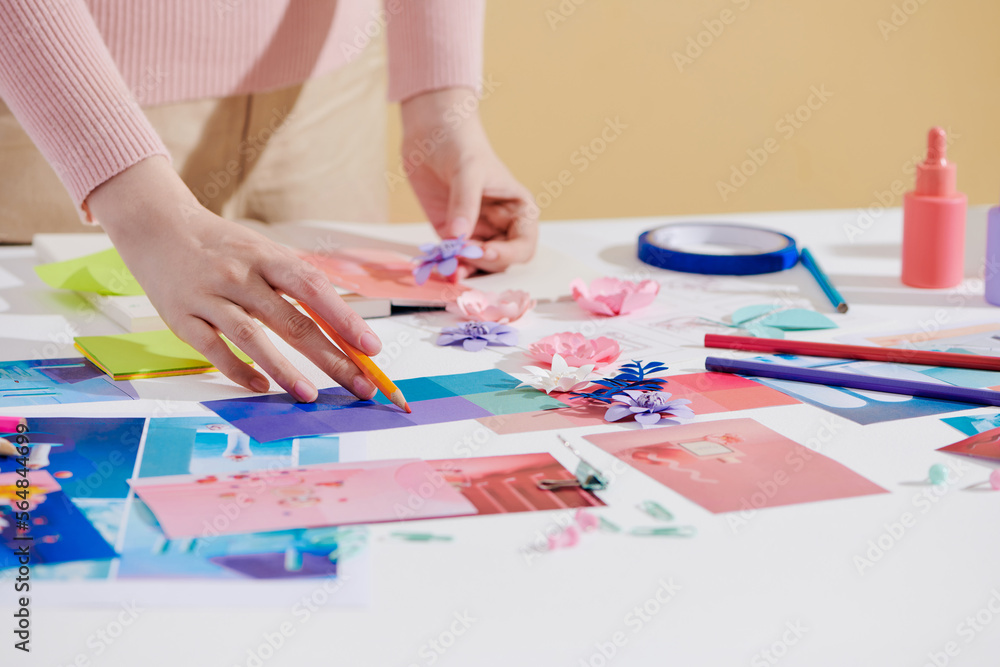 Creative stylist at work in her office studio Creative stylist at work in her office studio