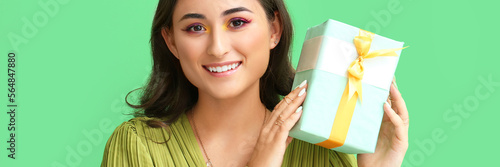 Pretty young woman with gif...