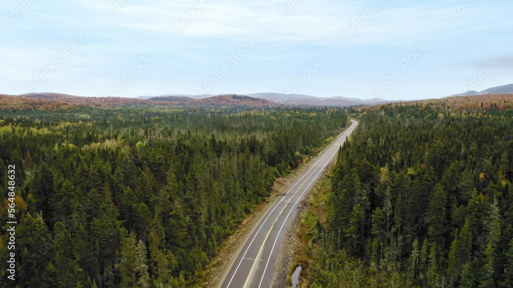 fly pass empty road in the mountains of Quebec in autumn fly pass empty road in the mountains of Quebec in autumn