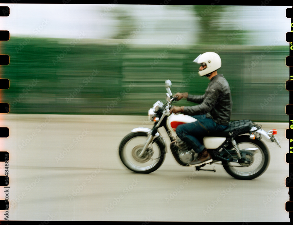 Motorcyclist in an urban environment Motorcyclist in an urban environment