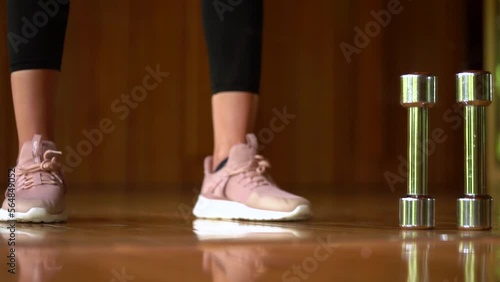 Woman Lifting Weighted Ball While Exercising - close up photo