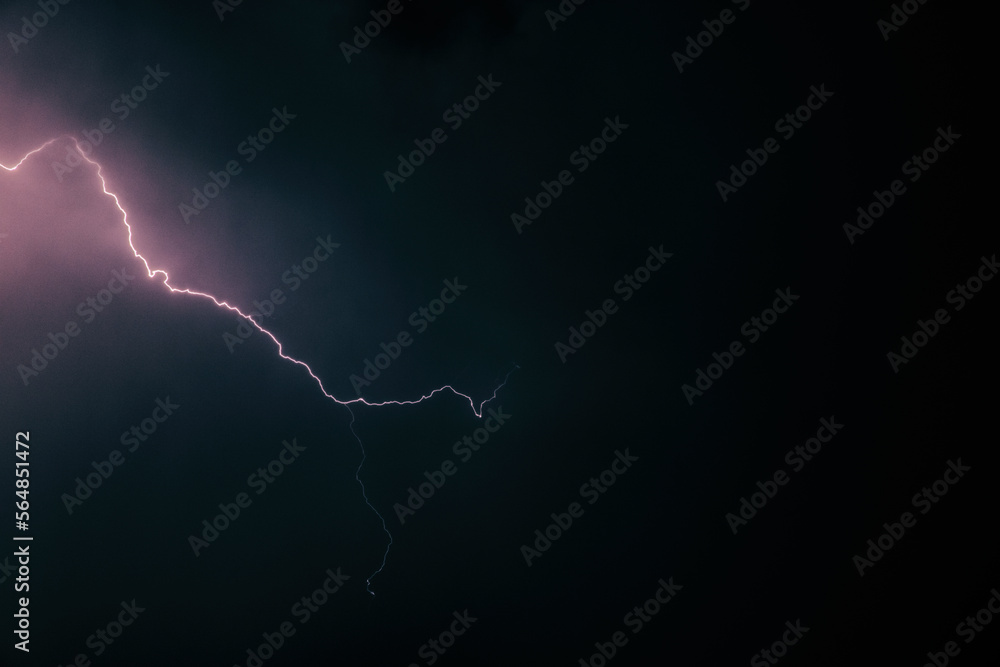 Lightning Bolt Across Stormy Night Sky Stock Photo | Adobe Stock