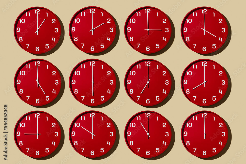 clocks set at different hours from 1 to 12 Stock Photo Adobe Stock