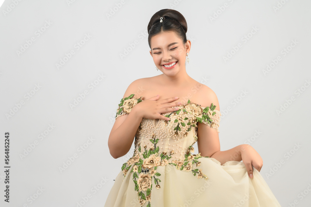 Young asian beautiful bride smiling with happy on white background Young asian beautiful bride smiling with happy on white background