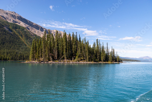 View of Rocky Mountains from a boat in Maligne Lake, Jasper NP, Canada