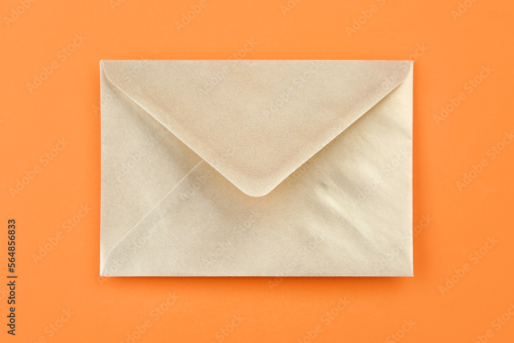 Golden envelope on color background Golden envelope on color background