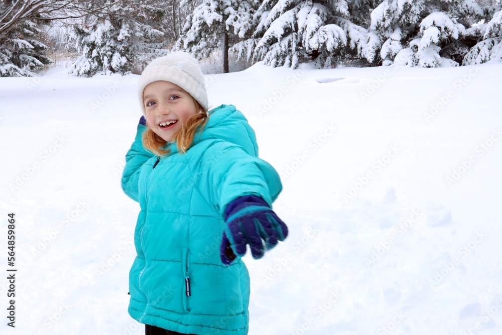 girl throwing a snowball