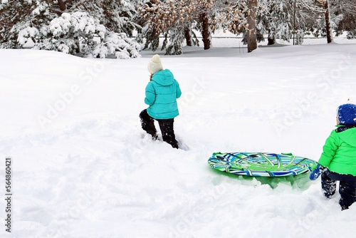 children walking in snow