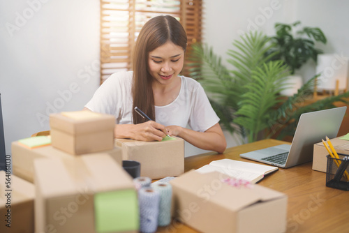 ecommerce and delivery service concept. Asian woman retail online.