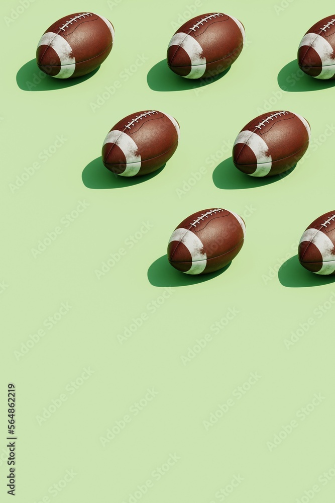 3d Rendering of several oval American football ball on a green. 3d Rendering of several oval American football ball on a green.