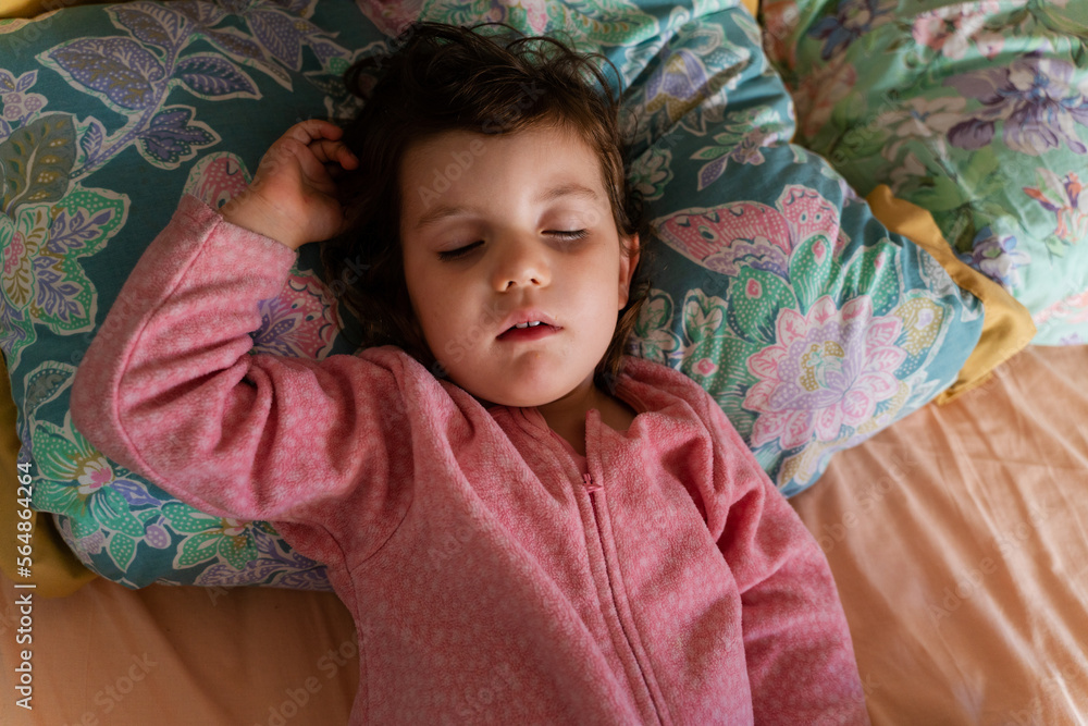 Little girl sleeping on bed Stock Photo | Adobe Stock