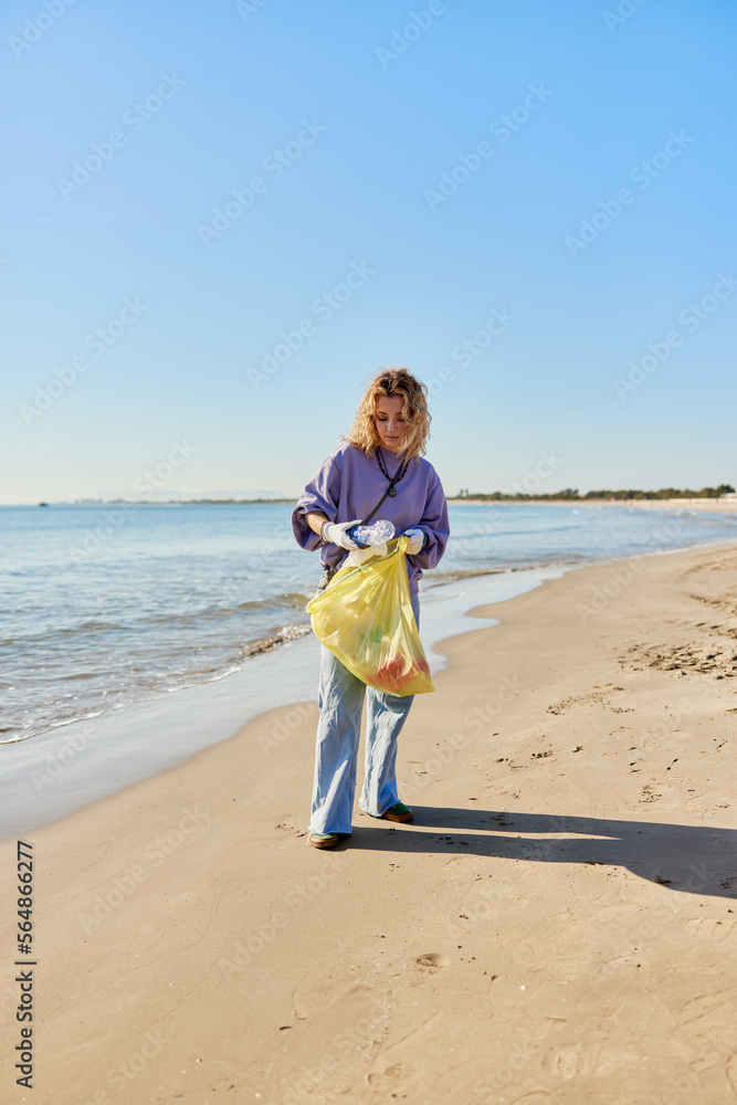 Volunteer with plastic bags Volunteer with plastic bags